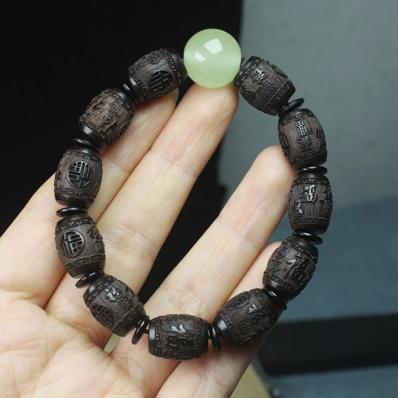 Ebony bracelet with engraved 