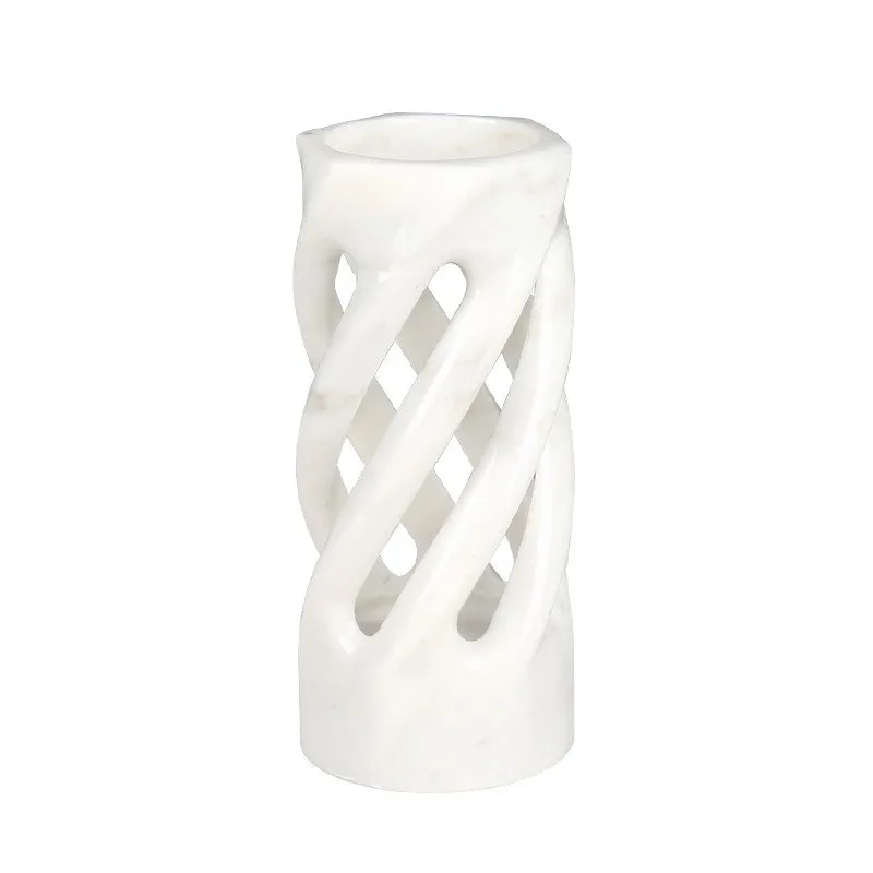 

Modern light luxury natural marble hollow vase, designer high-end flower ware in home model room