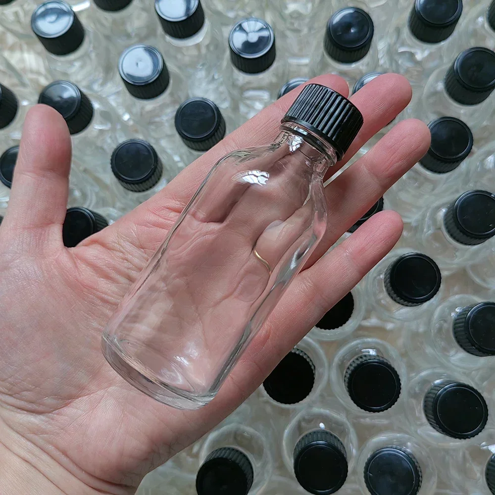 2oz Small Clear Glass Bottles with Lids Glass Containers Round Sample Bottles for Juice, Oils, Ginger Shots, Whiskey, Liquids