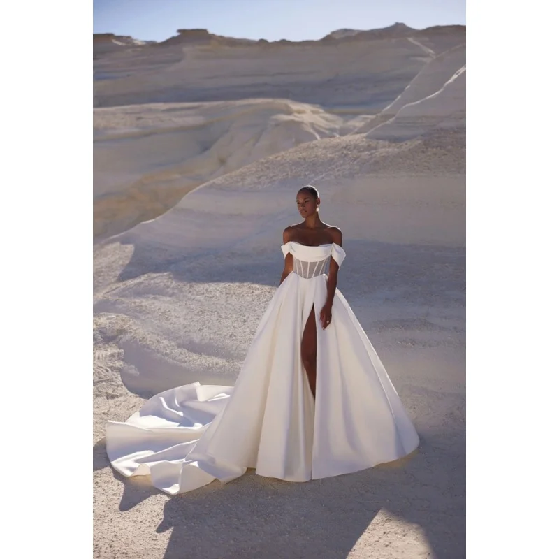 

Индивидуальное свадебное платье 2026 года: классическое белое, новейшее, с одним разрезом, пышной юбкой и открытыми плечами (Vestido De Novia)