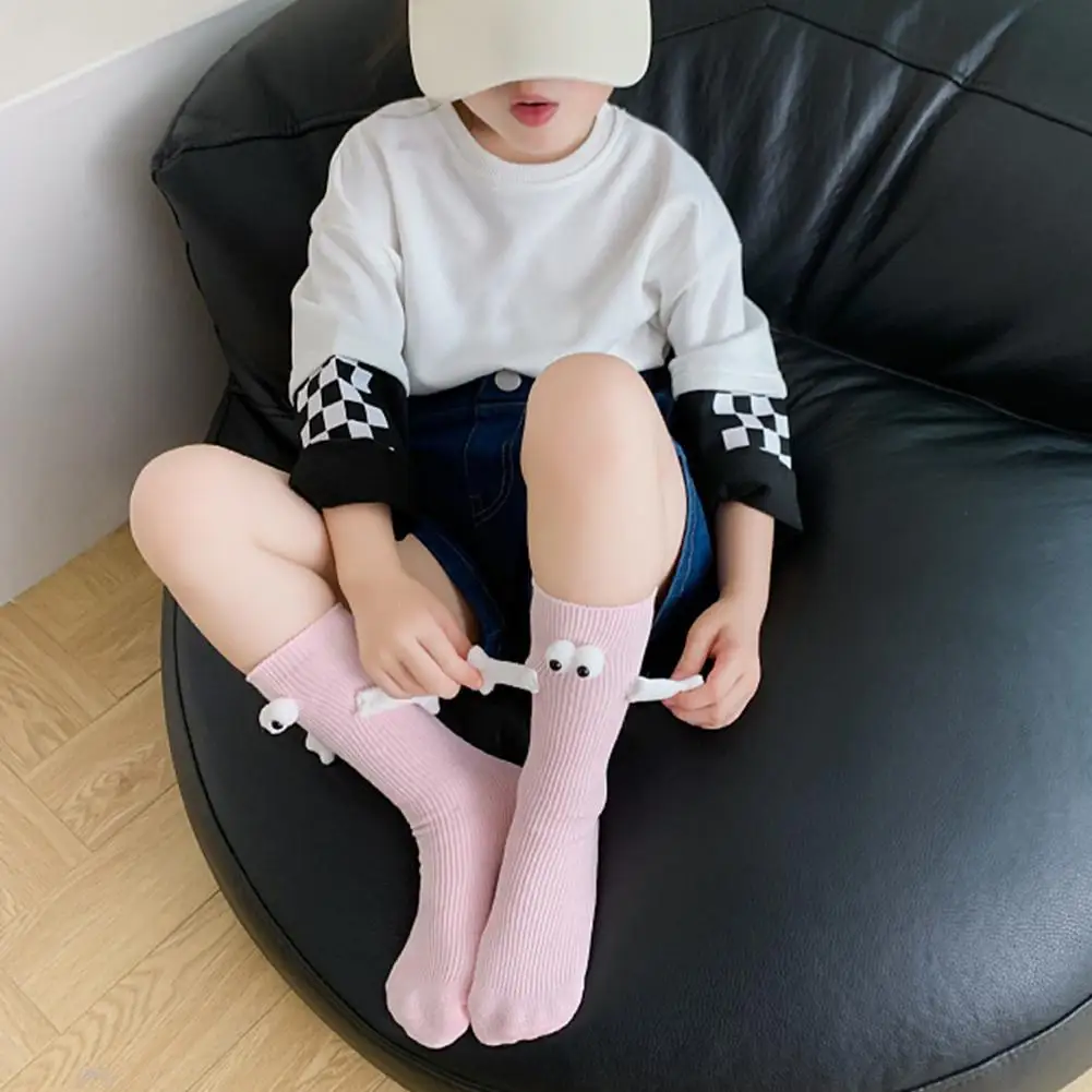 2 Pairs Magnetic Socks with Hands Women Men Fashion Black White Funny Cute Cartoon Eyes Couple Mid-tube Socks for Gifts