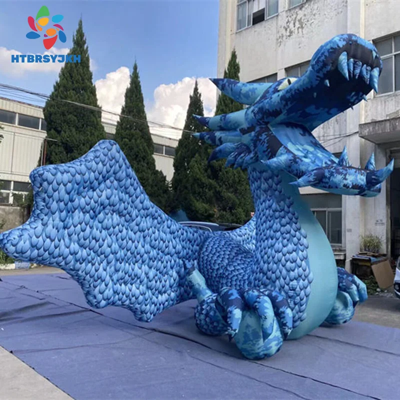 

Customize a blue inflatable dragon cartoon with wings for a flying dragon model, which is used for decoration at events.
