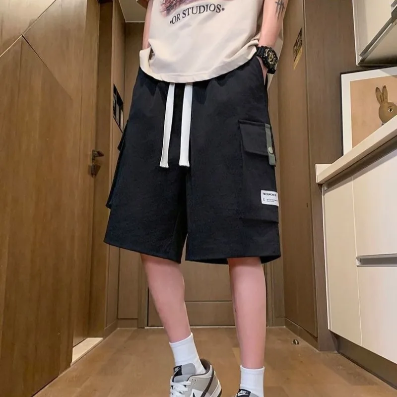 กางเกงขาสั้นสําหรับชายสีเขียวBaggyยืดหยุ่นเอวMens Half Cargoกางเกงขาสั้นStreetwearเสื้อผ้าElegantสบาย 2025 แฟชั่น