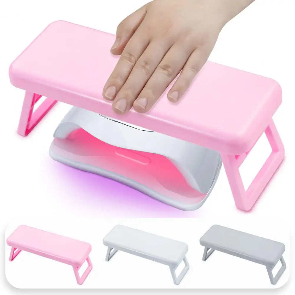 ネイルサロン用アームスタンド。ネイルサロンの設備やアクセサリーとして。折りたたみ式のプラスチック製アームスタンド。柔らかい人工皮革製のマニキュア用ハンド。