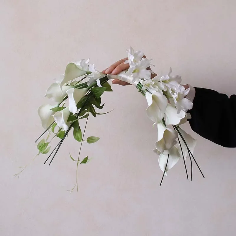 Artificial flower white calla lily bouquet fake flower bride photo studio with flower in hand