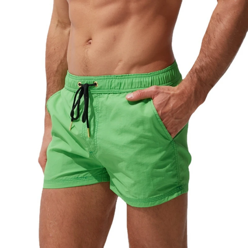 Calção de banho respirável com cordão monocromático masculino, shorts de praia, secagem rápida, roupa de banho impermeável, verão, 2025