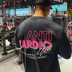 Uomo Fitness Bodybuildingt-shirt moda Casual Streetwear allentato allenamento in palestra mezza manica Drop spalla camicie per abbigliamento uomo