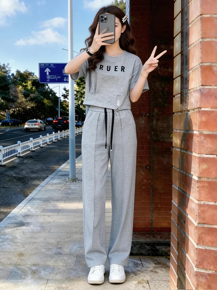 

Спортивный комплект из хлопка с высоким содержанием хлопка для женщин: летний новый повседневный комплект с круглым вырезом, коротким рукавом и широкими брюками