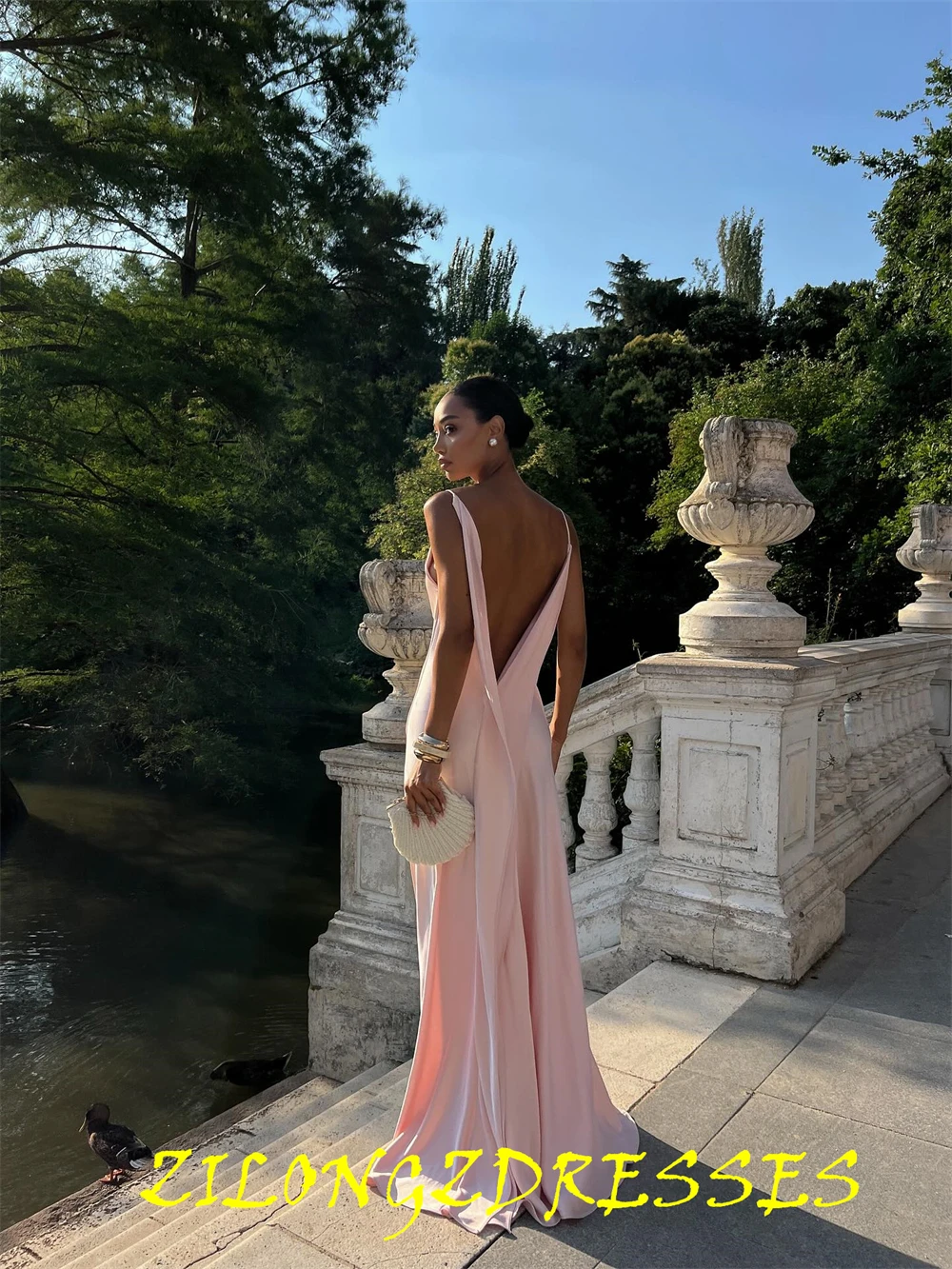 فستان سهرة فاخر من الساتان الوردي مخصص، فساتين رائعة بدون أكمام لحفلات العودة للوطن، فساتين حفلات مفتوحة الظهر بدون ظهر