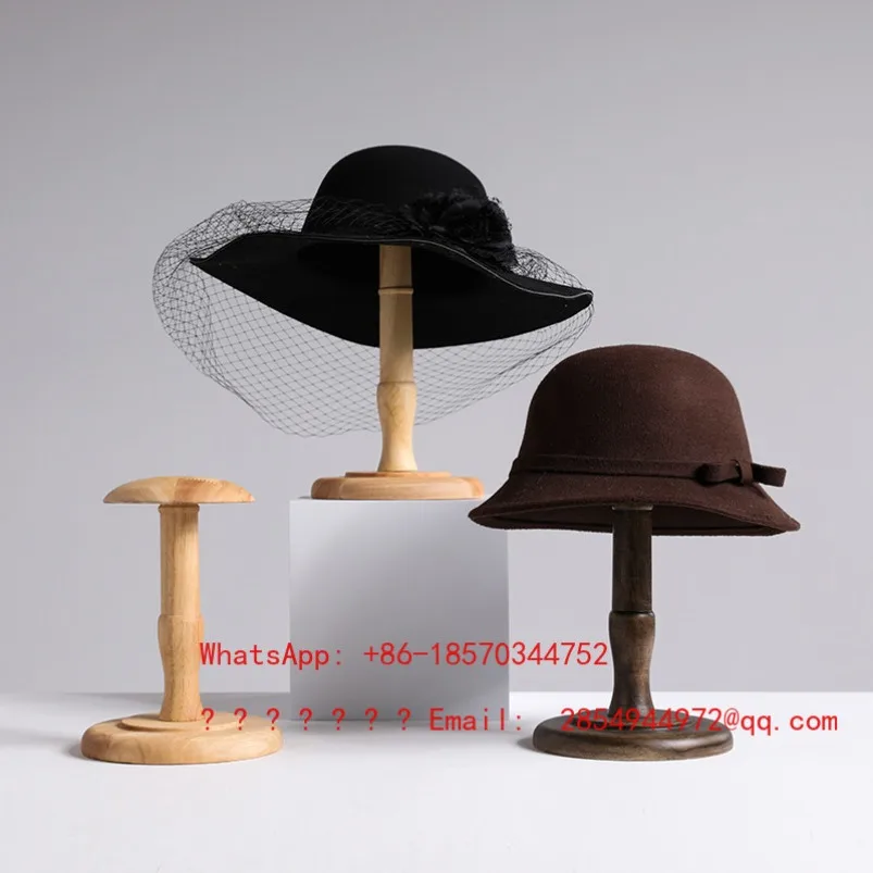 

Antique solid wood hat holder supports the display shelf for hanging hats