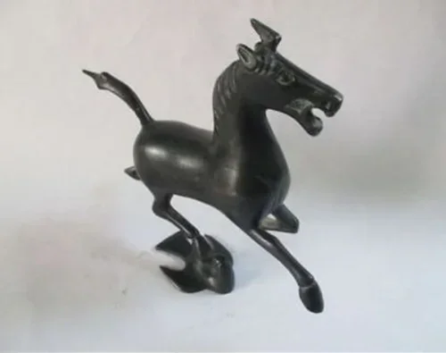 Ancient Chinese bronze statue. The horse stepped the swallow