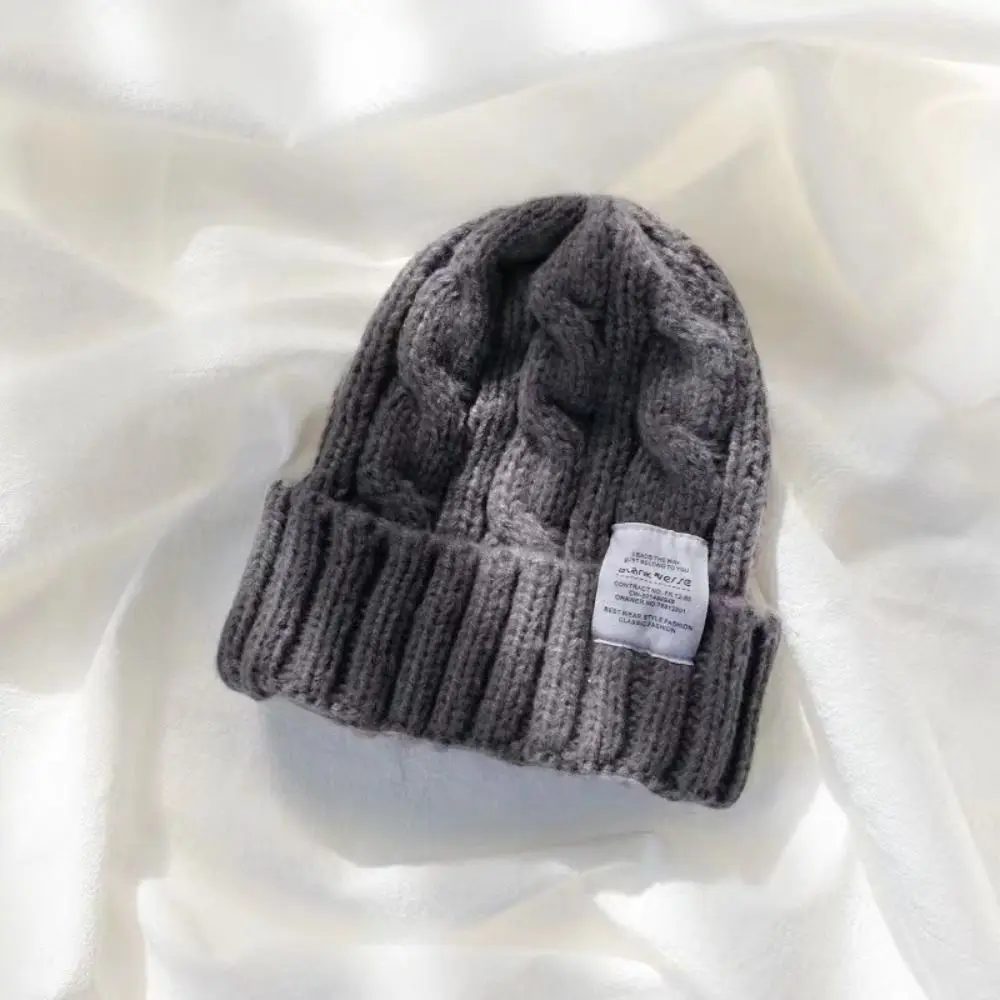 Korean Style Solid Color Knitted Beanie Hat Twist Knit Keep Warm Windproof Cap Elastic Thickened Ear Protection Hat Fall Gift