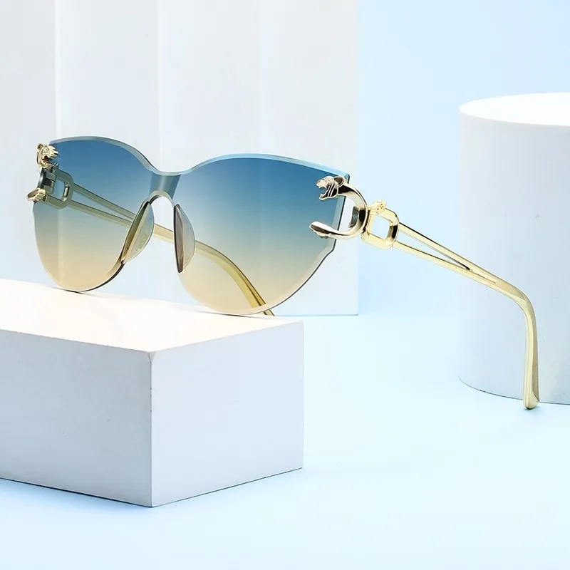 Katzenaugen-Sonnenbrille ohne Rand in Jelly-Farben, UV400-Schutz, Trendige Transparente Gläser für Streetstyle