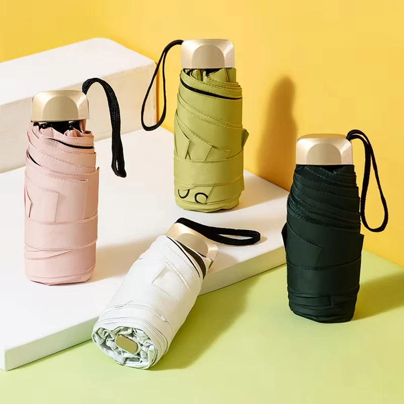 1Pc Mini Sun Umbrella Pocket Rain Umbrella Vinyl Folding UV Protection Sun Shade Ultraviolet Capsule Parasol for Pocket