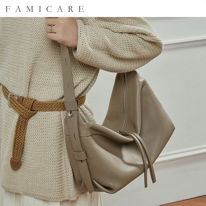 camiseta-nueva-de-invierno-2025-bolso-hobo-espacoso-de-cuero-de-grano-bandolera-de-un-solo-hombro-bolso-versatil-premium-de-ocio-para-mujer