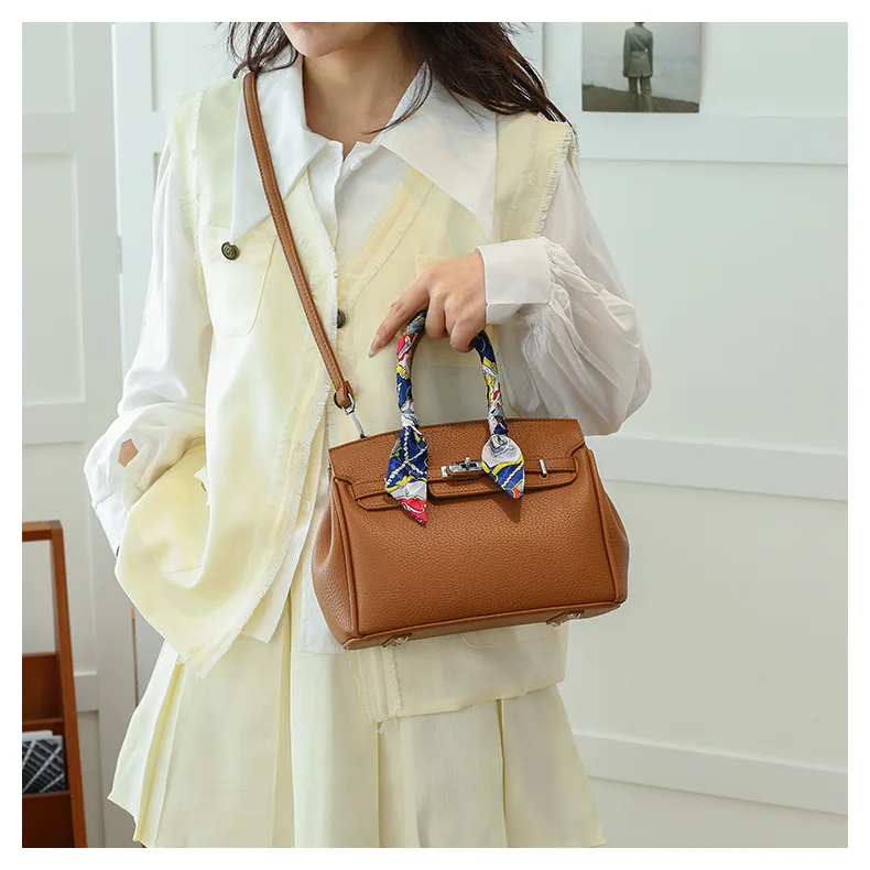 

Large capacity portable platinum bag women's bag 2025 new European and American retro Kelly bag textured shoulder messenger bag