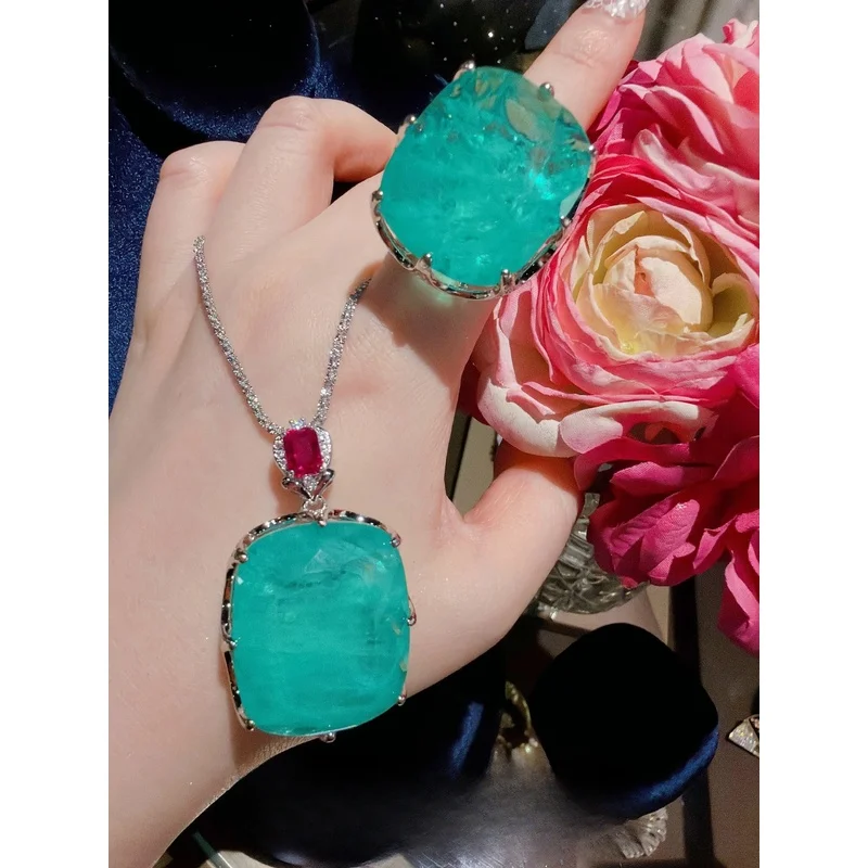 Jewelry Neon Light Maldives Blue Luxury10Carat pendant necklace with carved details and diamond-set sugar cube ring
