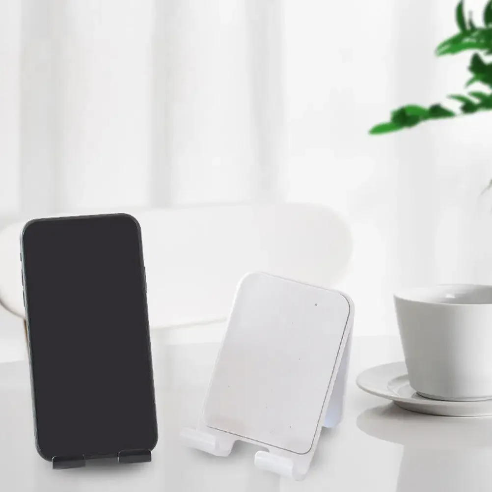 2 soportes adhesivos para teléfono, para montar en la pared, con base para cargar teléfonos móviles, soporte para smartphones y tableta, ideal para la oficina o el dormitorio.