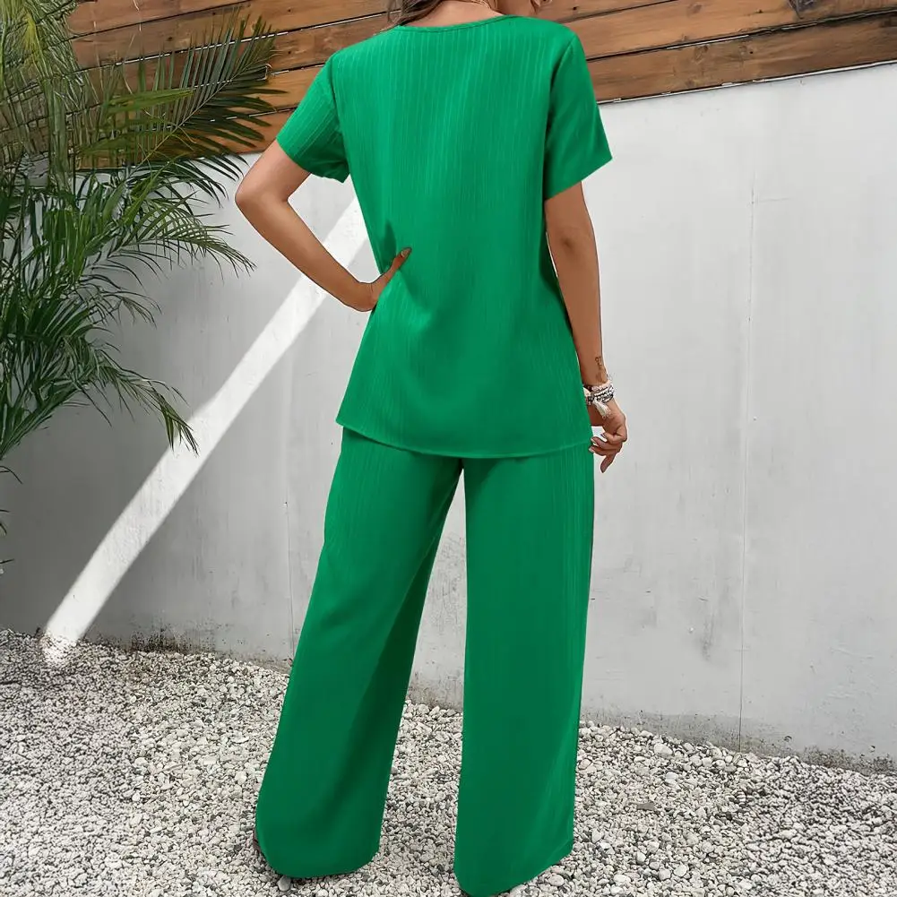 

2026 Fashion Casual Solid 2 Piece Set Women's Round Neck Short Sleeve Irregular Split Tops Elastic Waist Trousers Suit Commuting