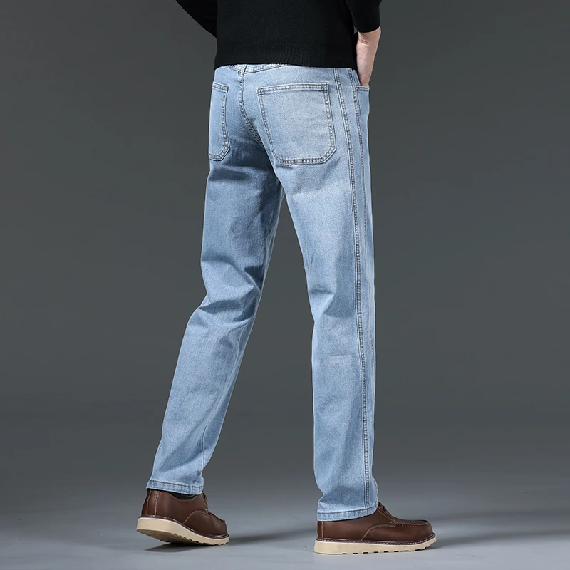 Abbigliamento classico da uomo Jeans larghi autunno nuovi pantaloni Casual da lavoro in tinta unita pantaloni in Denim moda uomo di marca