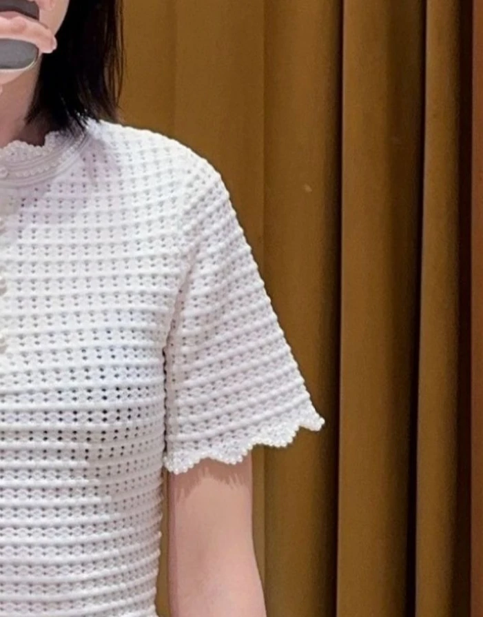 

Women's white hollow two-piece suit short-sleeved round neck cardigan or slim short skirt