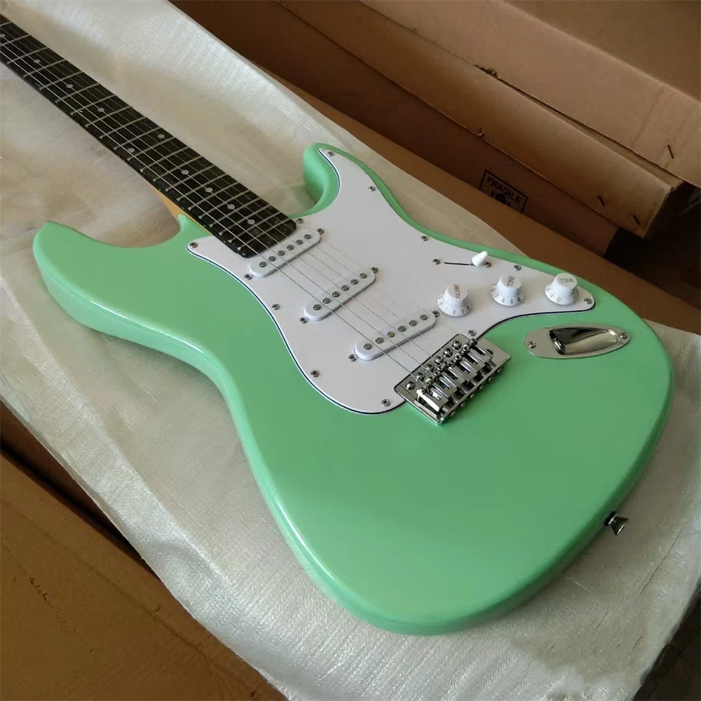 

Brand-new green electric guitar, equipped with SSS pickups, with standard sound quality