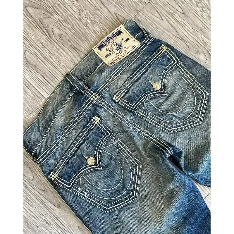 2025 Pantalones de pierna ancha bordados de pierna recta de cintura alta Retro Harajuku para hombres y mujeres usan pantalones vaqueros casuales de calle bordados de los años 2000.