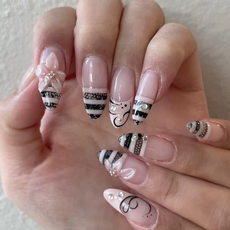 24PCS Pink Almond Press on Nails Sweet 3D Carved Flowers Cute Black Lace Striped Patterns French False Nails Wearable Fake Nails