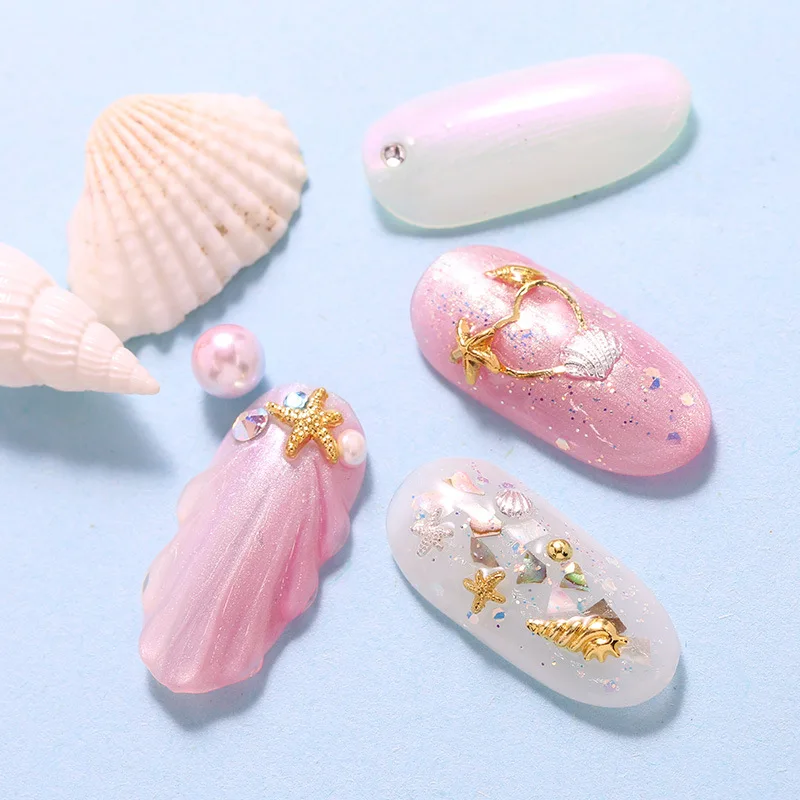 100 sztuk złota muszla rozgwiazda zawieszki do paznokci metalowe nity akcesoria ozdoby do paznokci 3D mieszane muszle gwiazda Manicure szpilki część — zdjęcie 3