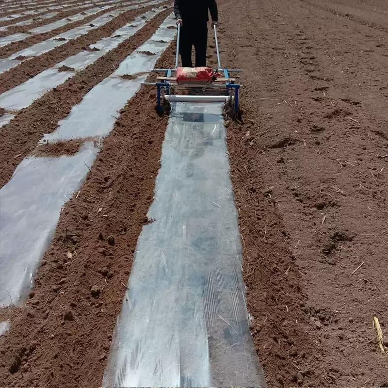 Multifunctional hand-pulled film machine Agricultural film laying machine