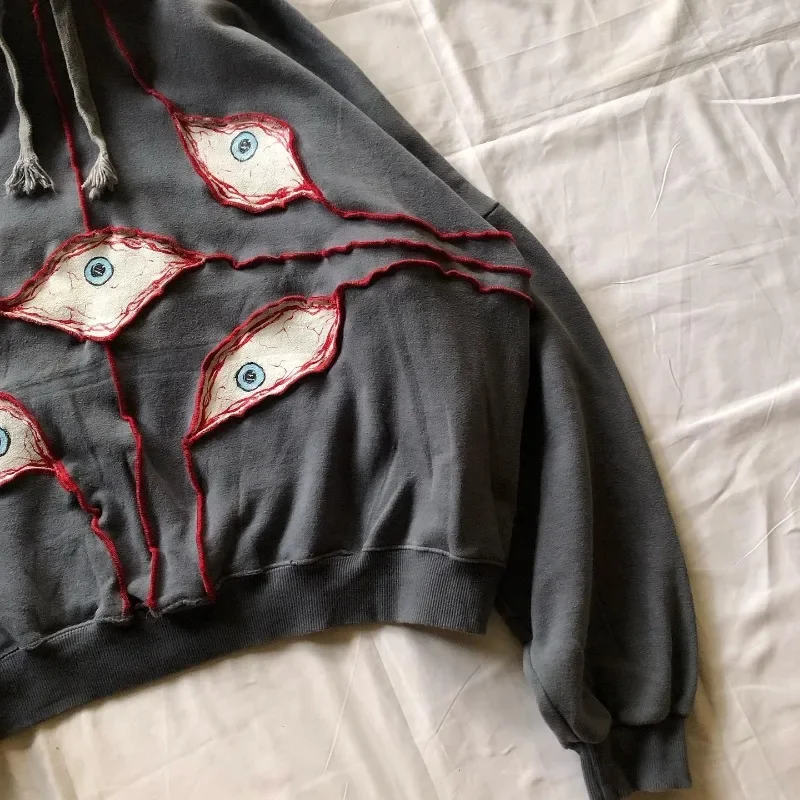 Sudadera con capucha Y2K Harajuku para hombre y mujer, ropa de calle vintage con bordado de Ojos de demonio, Hip Hop, jersey de moda americana de