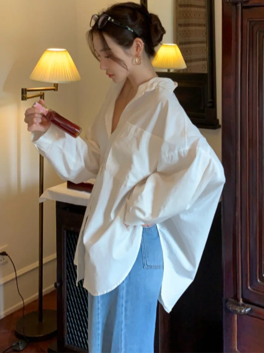 Chic printemps décontracté coupe ample longue Sve irt femmes col rabattu petits boutons polyvalent confortable chemisier asymétrique