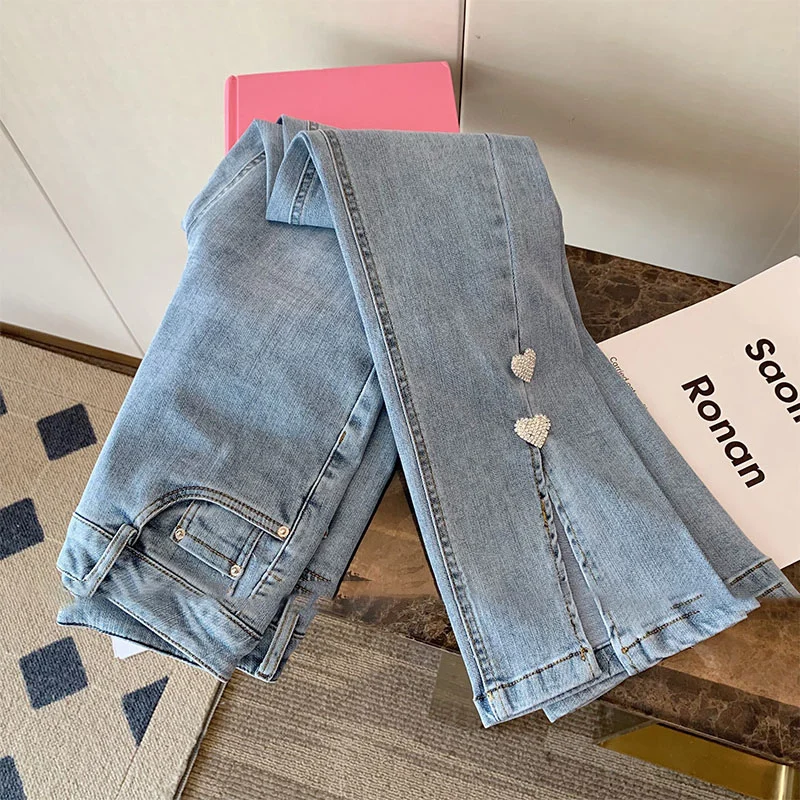 2023 primavera nuove donne Jeans a vita alta dritto diviso morbido Denim pantaloni moda cuore Appliques pantaloni lunghi