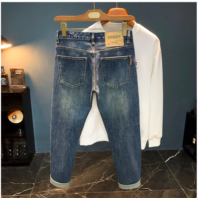 

High end light luxury men's jeans trend print new autumn men's clothing casual small feet retro blue pants