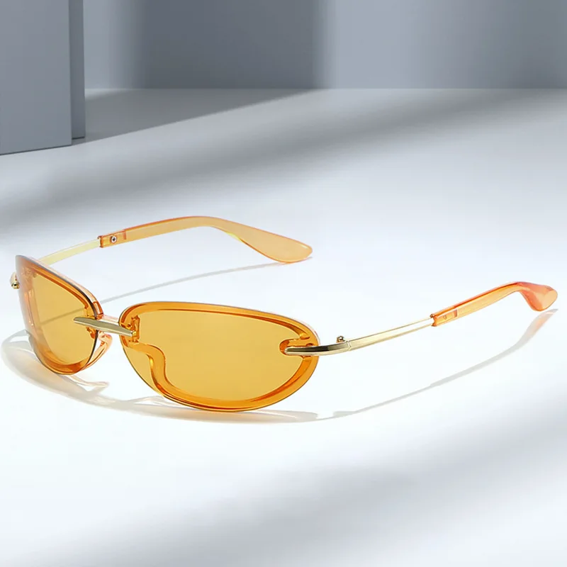 

Frameless Metal Y2K Elliptical Sunglasses Tea Colored Fashionable Cut Edge UV Resistant Sunglasses Solid UV400 Men and Women