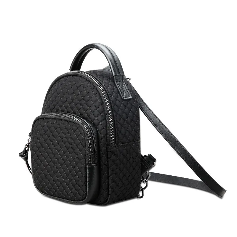 Zaino Casual da donna impermeabile tinta unita borse da scuola di grande capacità borsa da viaggio in Nylon Mochila per donna