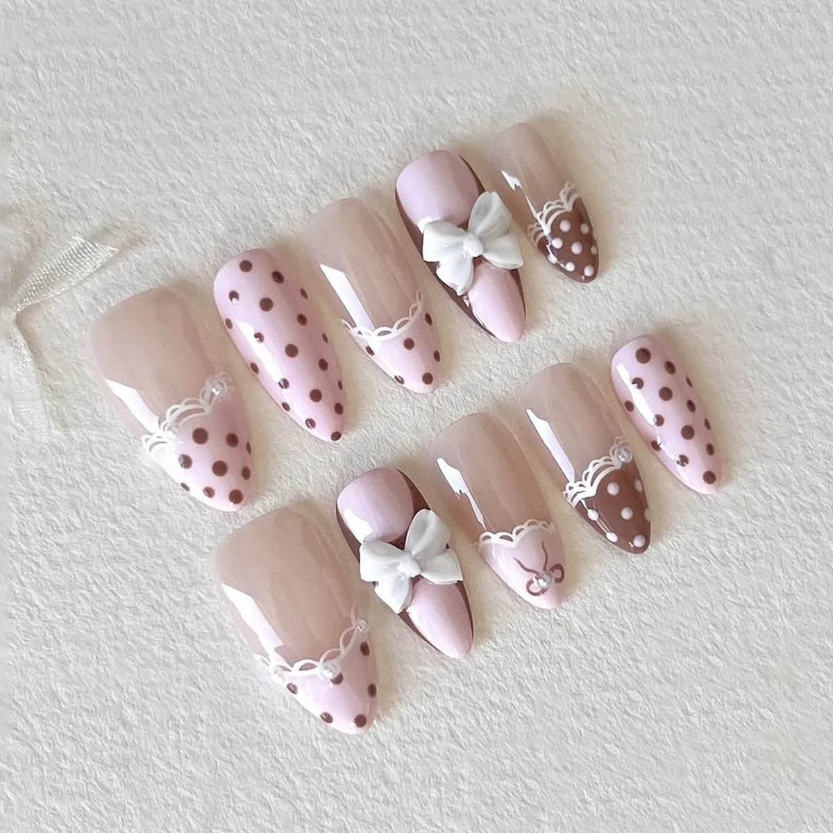 

24Pcs Mid-length Almond Fake Nails Pink Brown Polka Dot Lace French Press on False Nails 3D Bow Pearl Wearable Manicure Tips Art