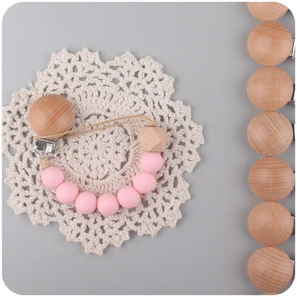 مهديء حامل الخشب طفل الحلمة حامل كليب الدمية كليب الطفل هوة سلسلة هوة حامل مقاطع الطفل عضاضة اللعب الأشرطة