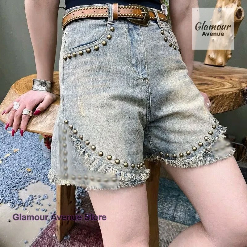 French retro heavy rivet denim shorts women's new summer fashion temperament loose and slim Joker casual wide-leg pants.