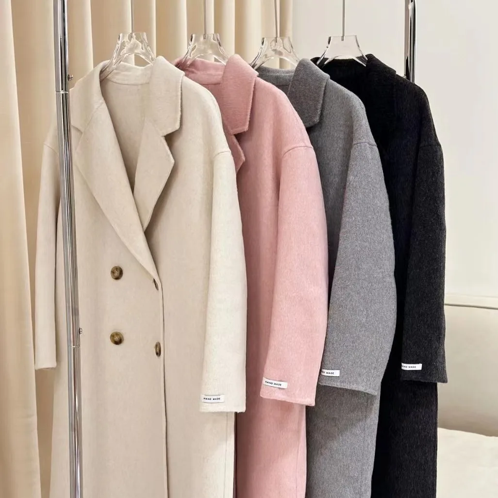 2025 Cappotto di lana con petto abbassato da donna primaverile Cappotto invernale in cashmere stile sciolto Cappotti lunghi Top Nuovo