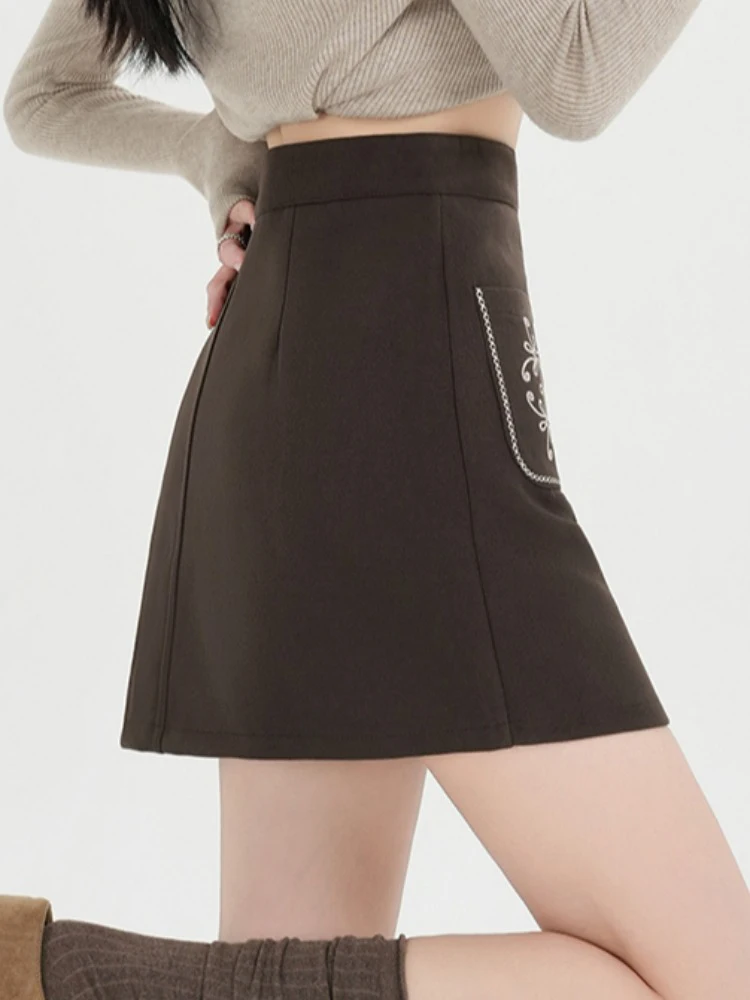 กระโปรงขนสัตว์ปักลายซิป ดีไซน์เก๋สำหรับผู้หญิงในฤดูหนาว ทรงเอ กระโปรงสั้นแบบพันรอบสะโพก ป้องกันแสงสะท้อน ดีไซน์หวาน