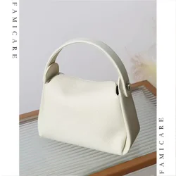 Venta al por mayor, bolso bonito para mujer, bolso de mano de piel auténtica con caja a la moda, bolso de hombro cruzado de nicho para mujer, bandolera de gama alta