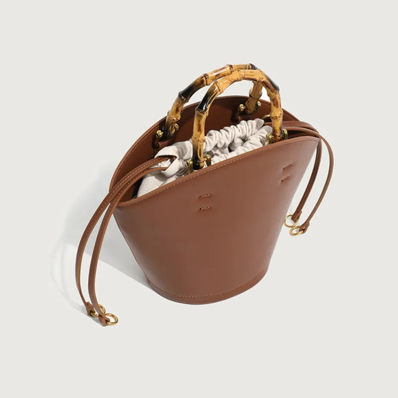 2025 PU grande capacité sac fourre-tout Vintage haut de gamme Texture bambou noeud sacs à main ventilateur conception femmes à la mode épaule