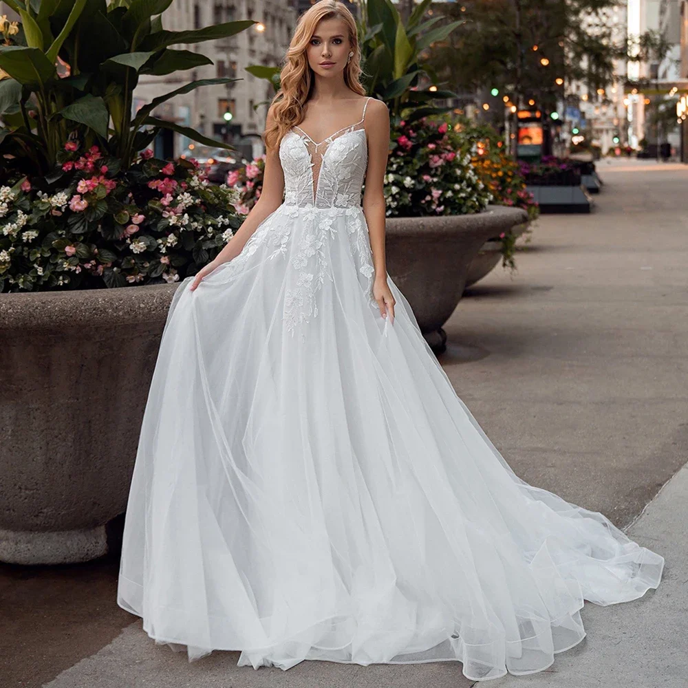 

White Wedding Dresses Sleeveless V-Neck A-Line Robe De mariée Exquisite Beading Sequin Appliques Tulle Bridal Gown