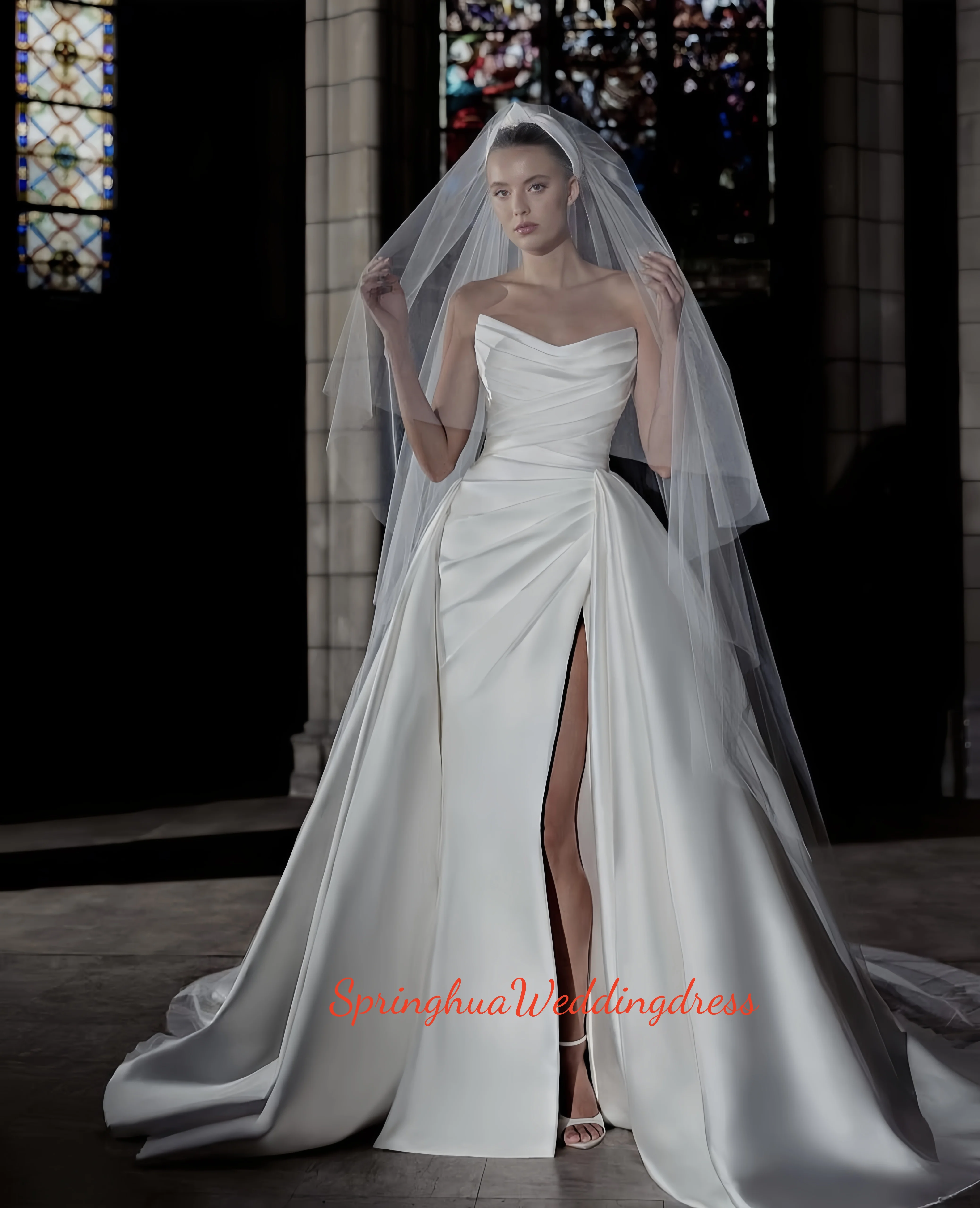 

A custom-made elegant 2-in-1 one-line wedding dress with a high-quality satin finish is designed to open the bride's front hall