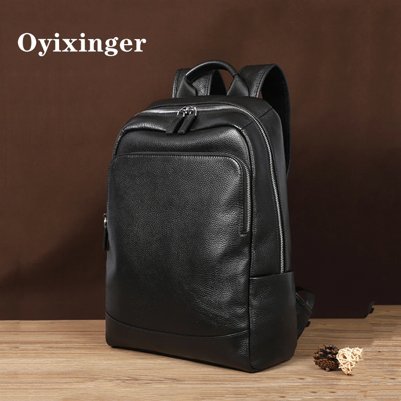 

OYIXINGER New Luxury Genuine Leather Men's Backpack Casual Large Capacity Shoolbag For Boy Solid Cowhide Male Travel Backpack