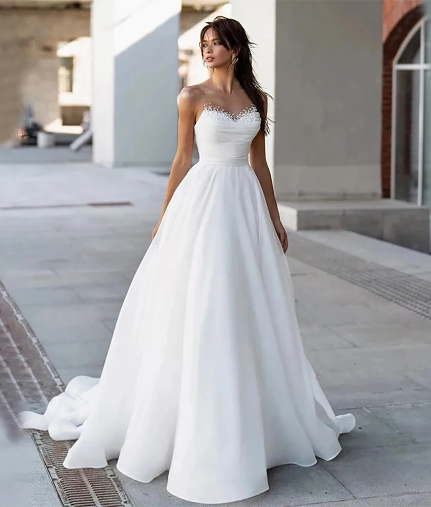 

Victoria Customized Luxury Tulle A-Line Pearls Beading Evening Dress High Quality Sweetheart Sleeveless Women Wedding Gowns