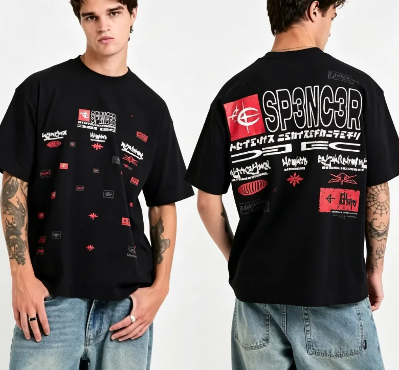 2026 Sticker fragment print graffiti logo on the back with distorted letter patterns. Unisex cotton short-sleeved T-shirt.