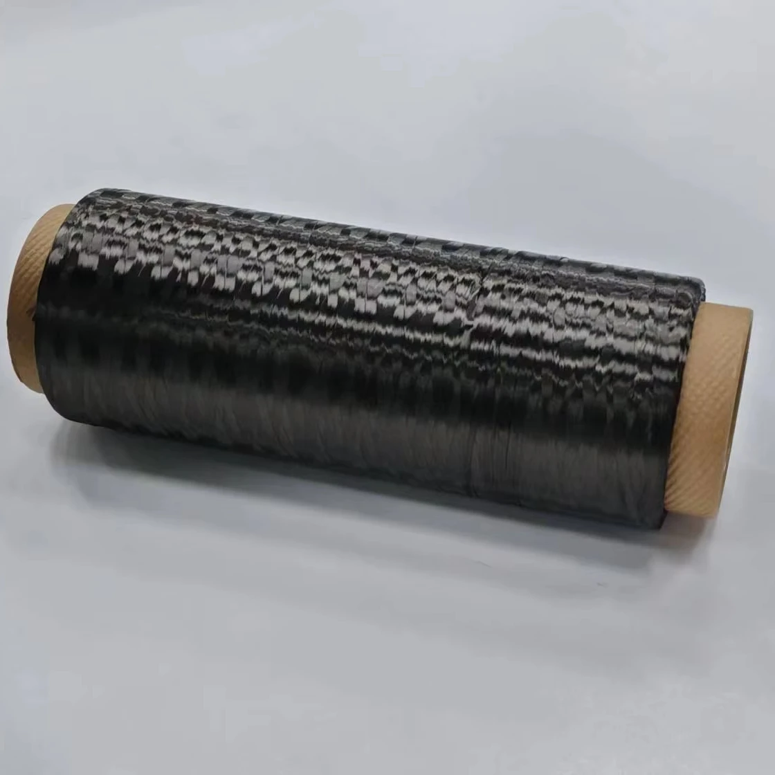 

High Strength Carbon Fiber Filament Yarn 3K Black Heat Resistant Fiber For Composite Materials UAV Use