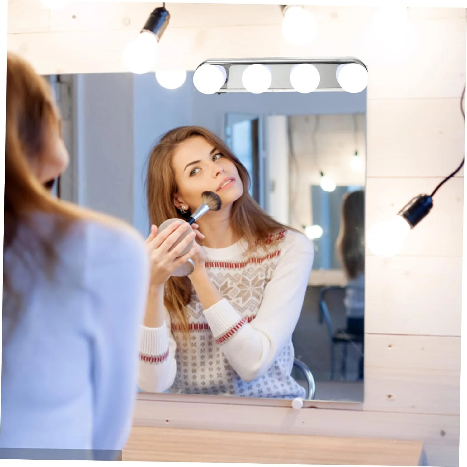 A must-have accessory for beauty enthusiasts, this sleek, portable, and modern Rechargeable Lighted Makeup Mirror is a game-chan